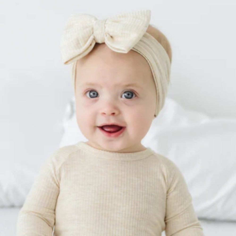 SOLD Little Sleepies Oatmeal Crescent Zippy and Luxe bow Bundle 6-12 months